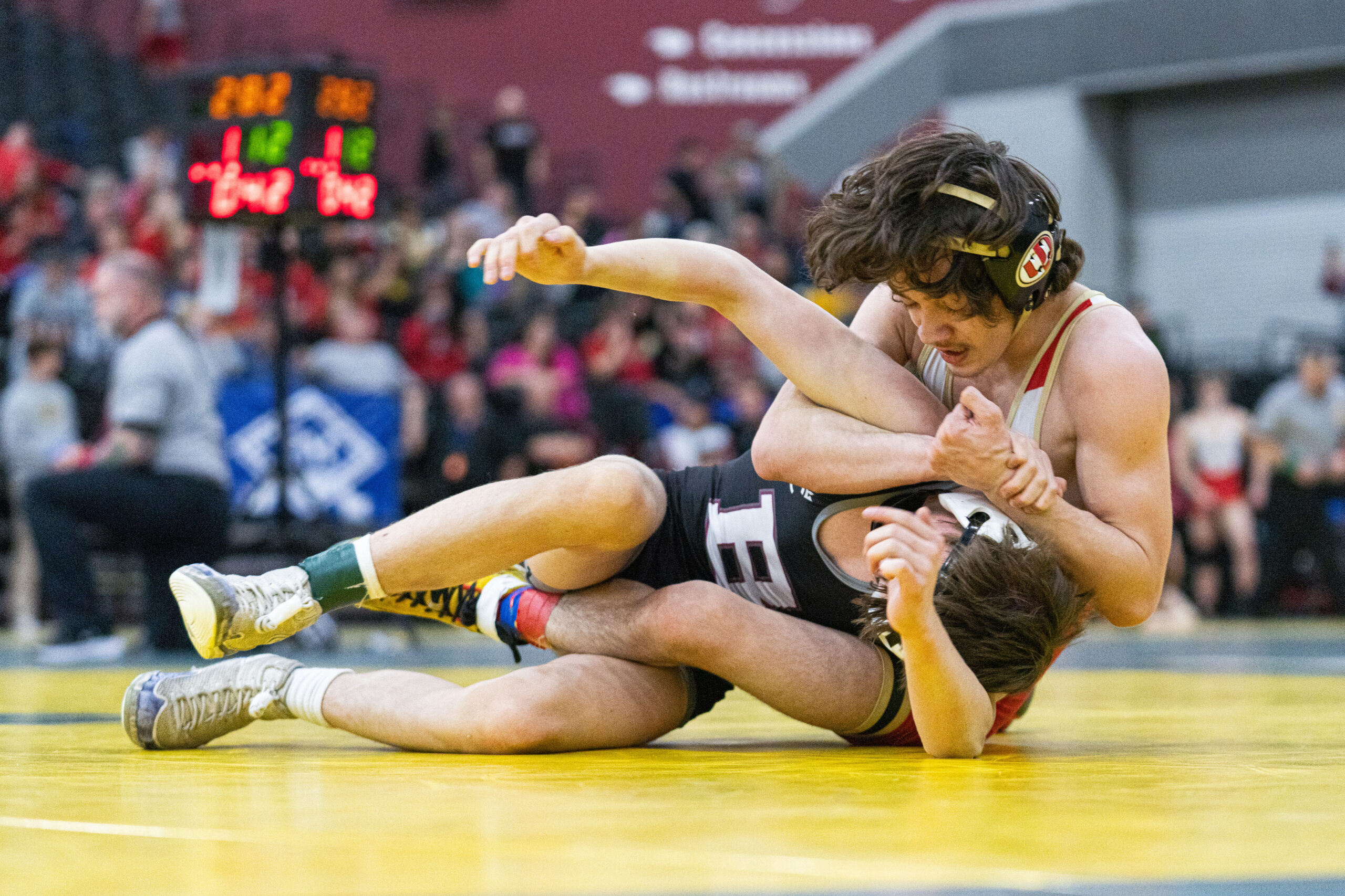 University leads team standings after day 2 of state tournament with 11 wrestlers still in bracket